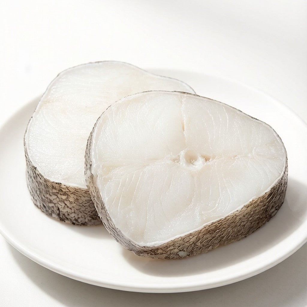 Steamed cod loin steaks finished with ginger and scallion